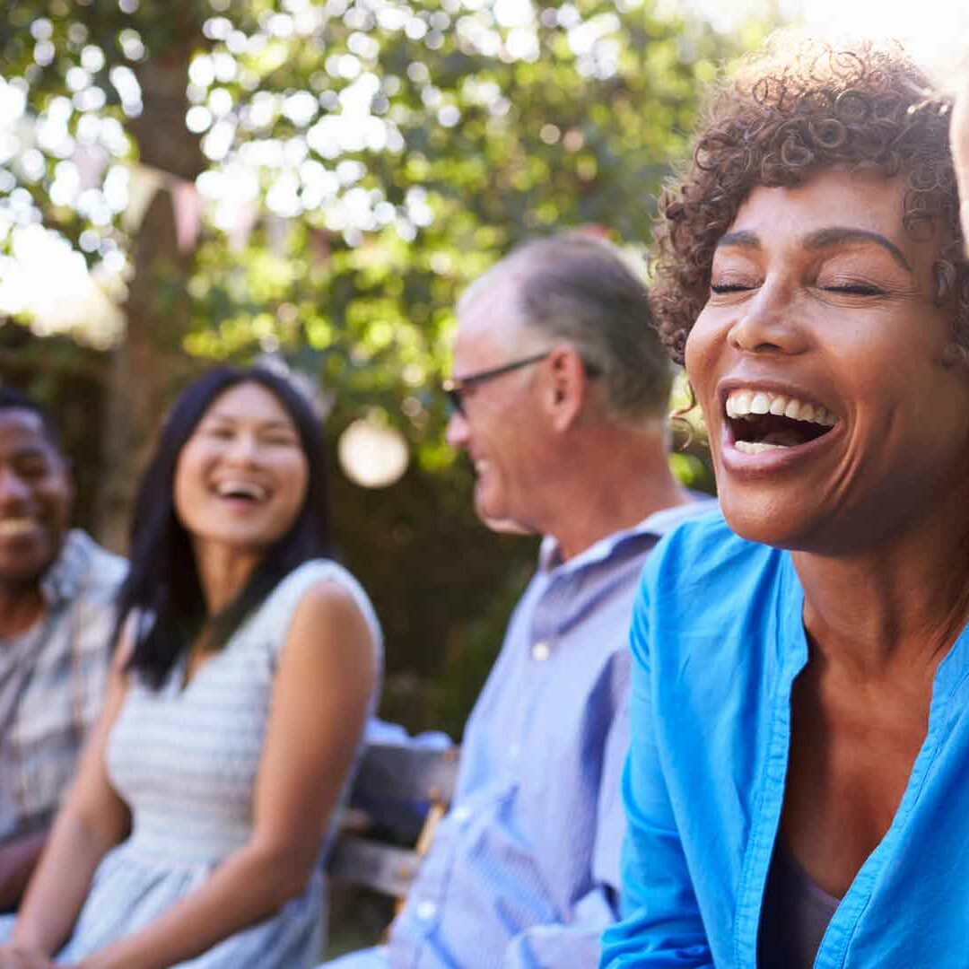 Adults socializing at community event